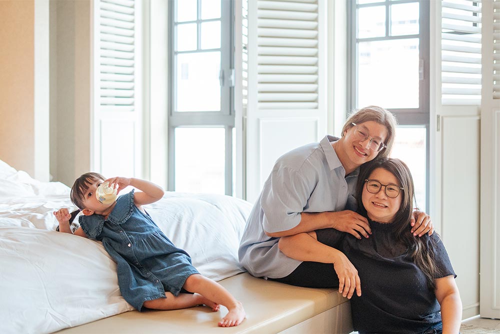 Inclusive family photographer Singapore session a 4 year old with autism playing relaxing during a relaxed photoshoot