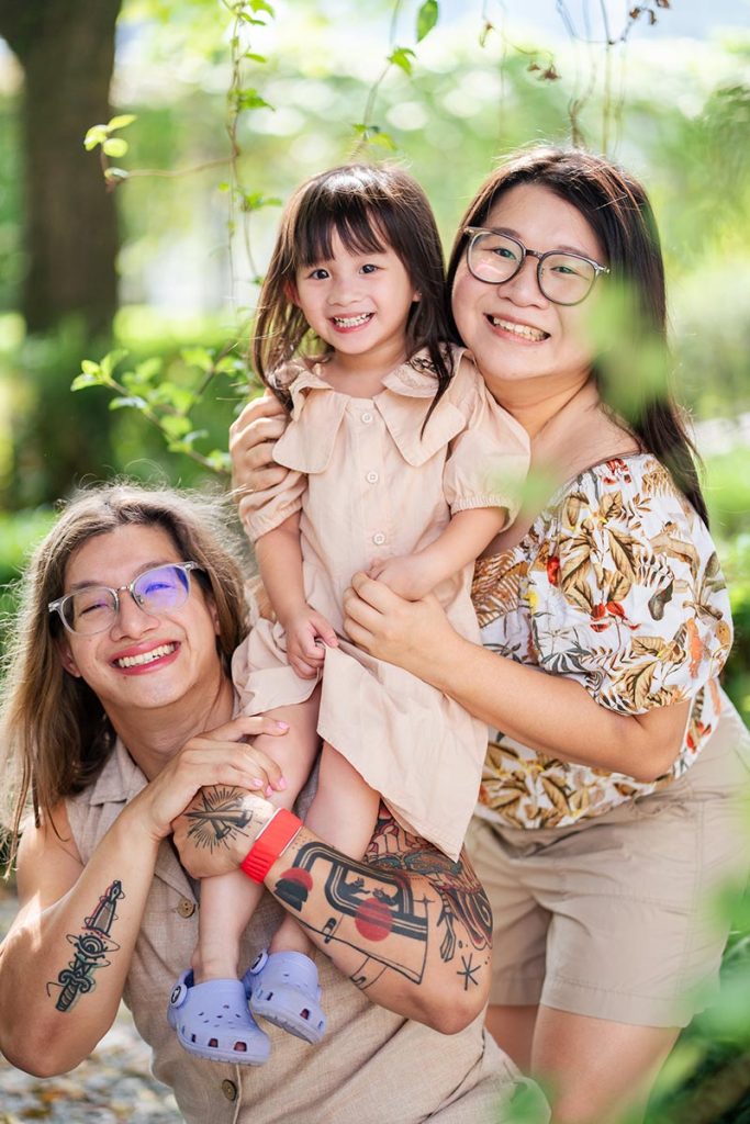 LGBTQ+ family photographer Singapore capturing an authentic portrait of two parents and their daughter with special needs