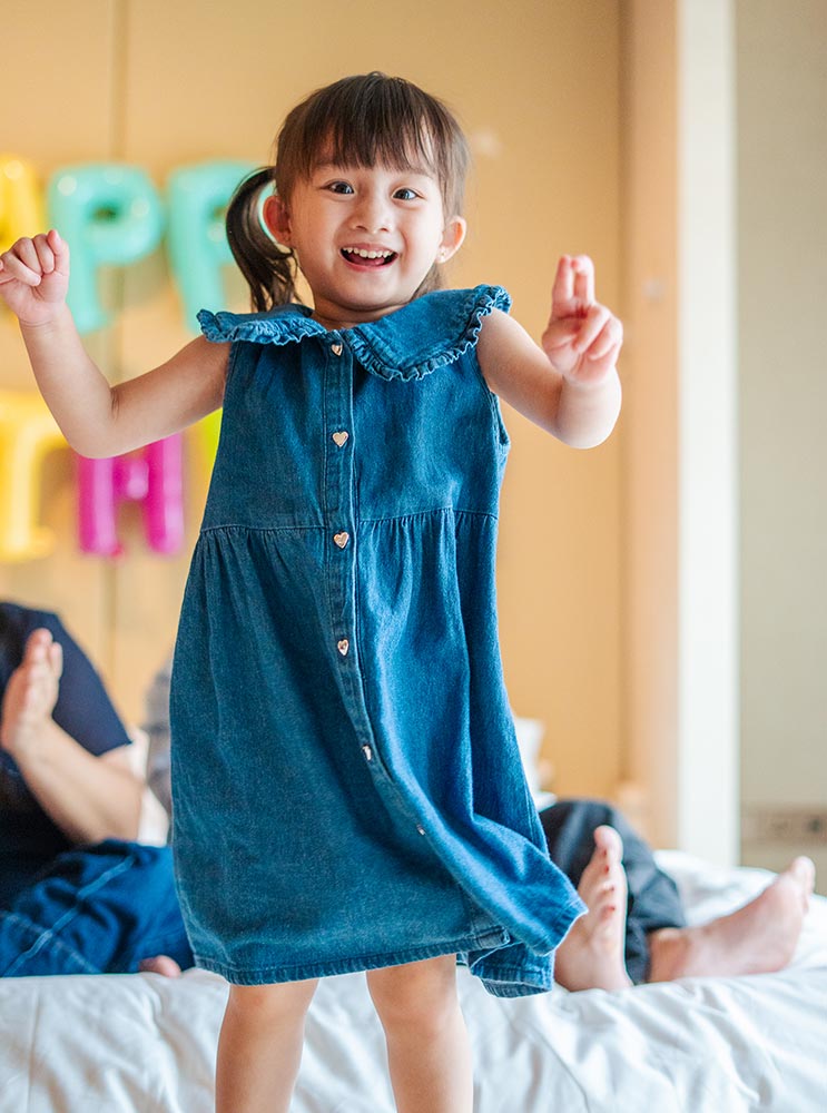 LGBTQ+ family photographer Singapore capturing an authentic portrait of girl with special needs
